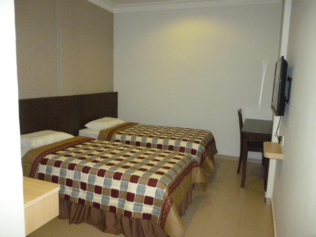 G Six Hotel Sitiawan Zimmer foto